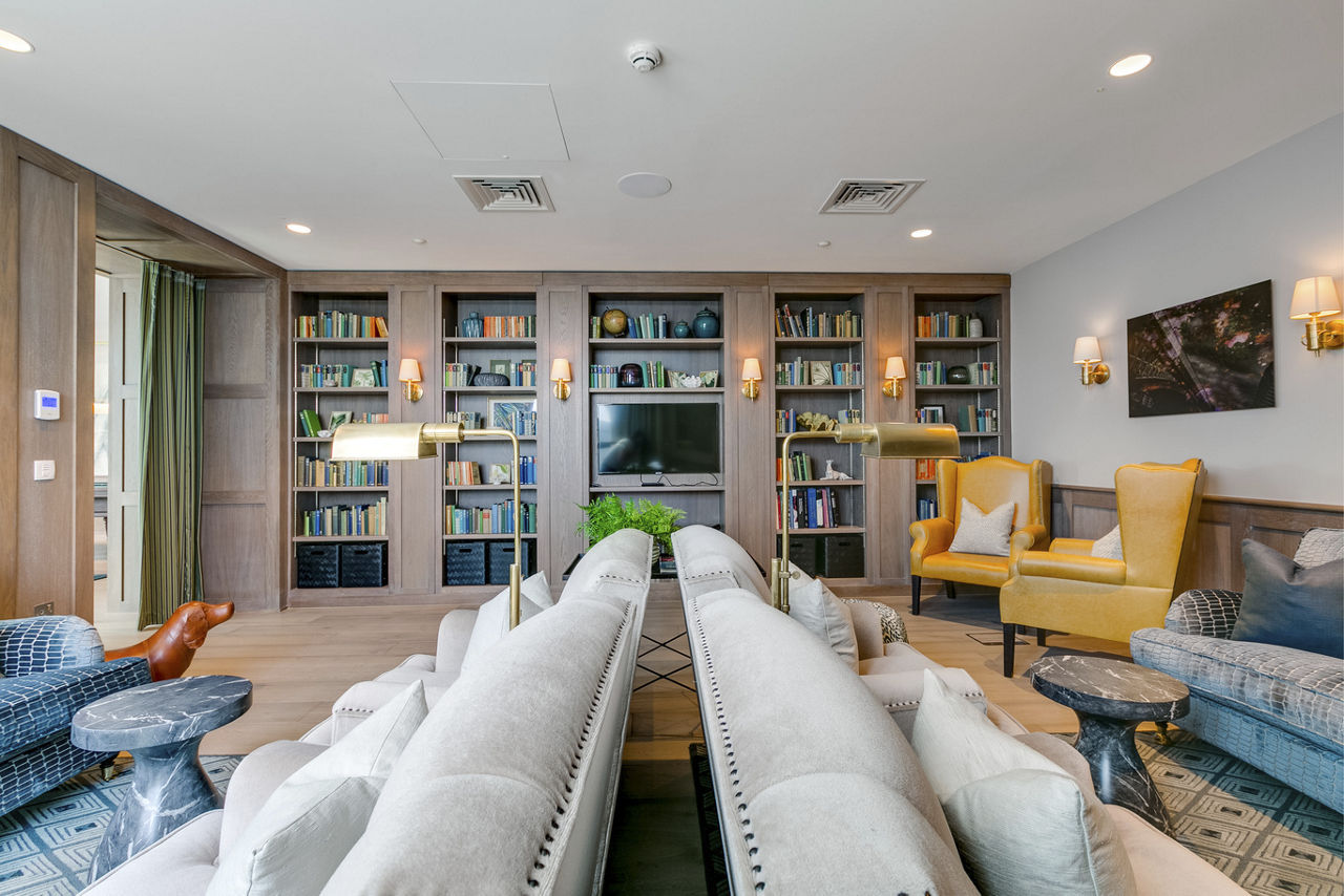 Two grey couches in a communal space | Blog | Greystar